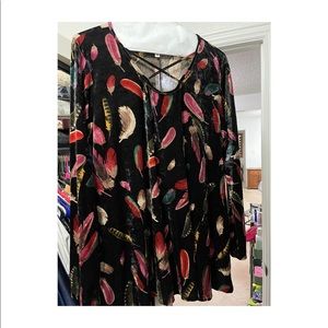 Long sleeve. Feels like velvet.